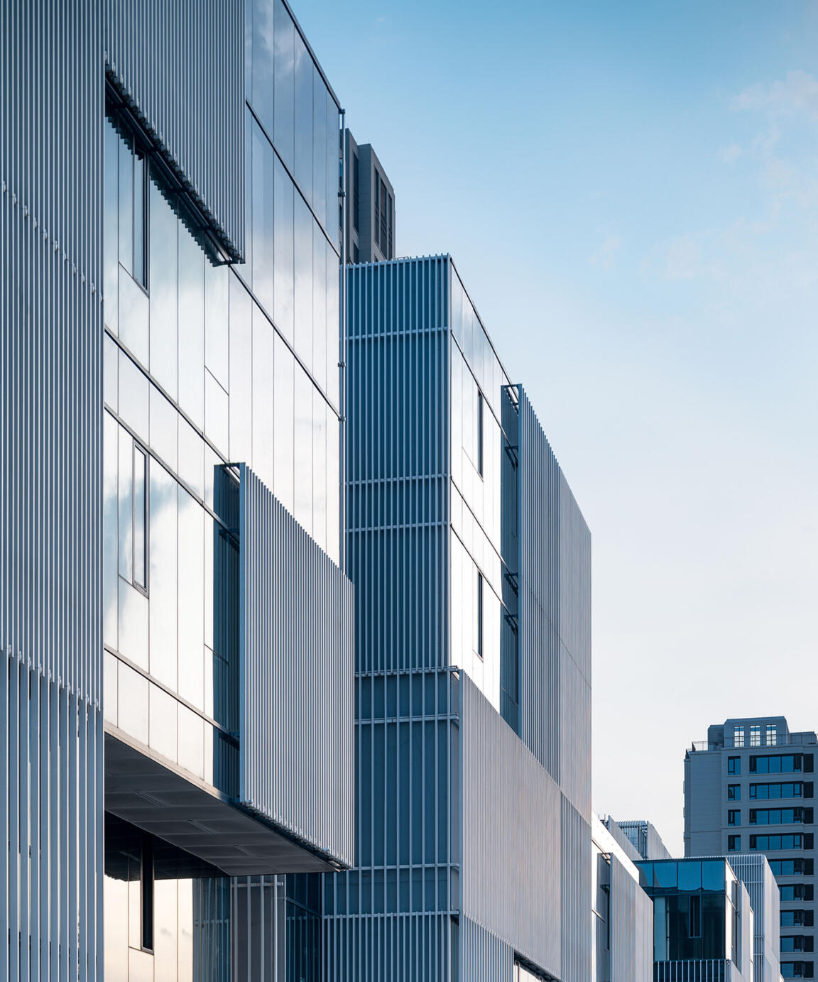 community retail centre, glass curtain wall, aluminium grille facade, hangzhou, vanke xiaoshan, clou architects